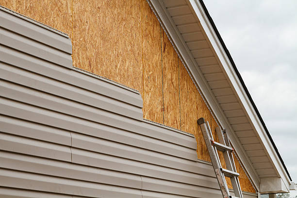 Professional Vinyl Siding technician working in Norwood, NY